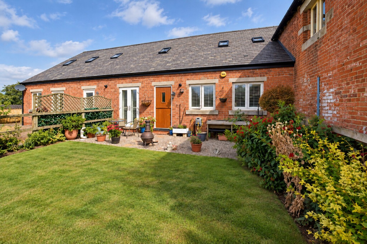 Photograph of Adderley Hall Barns, Adderley, from the original listing